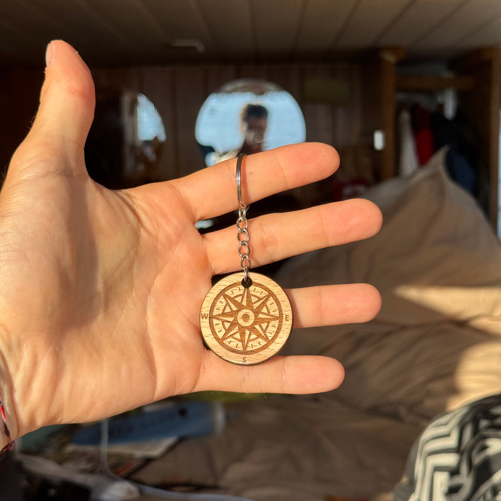 Porte clés "Boussole" 2 chances de gagner le van