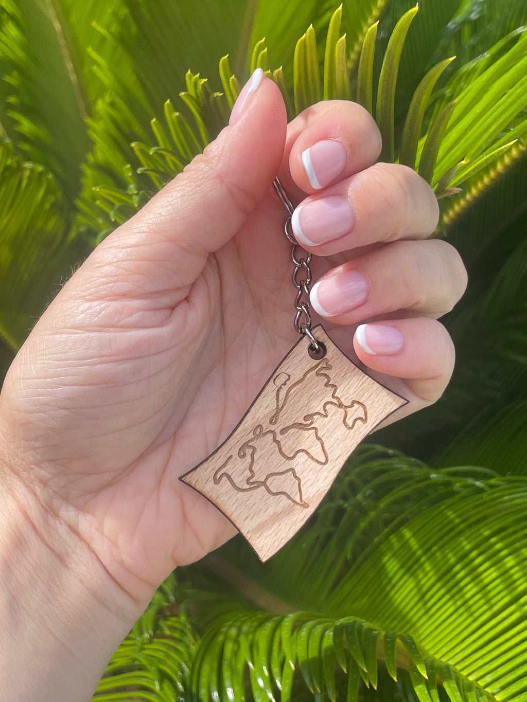 Porte-clé "Carte du monde" 1 chance de gagner le van