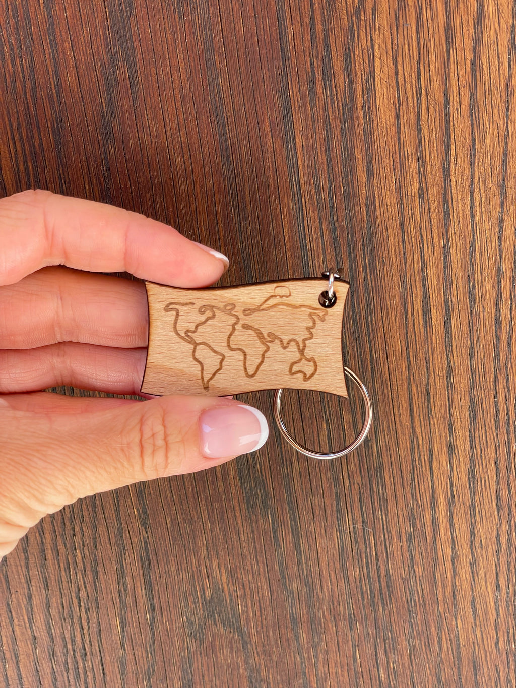 Porte-clé "Carte du monde" 1 chance de gagner le van